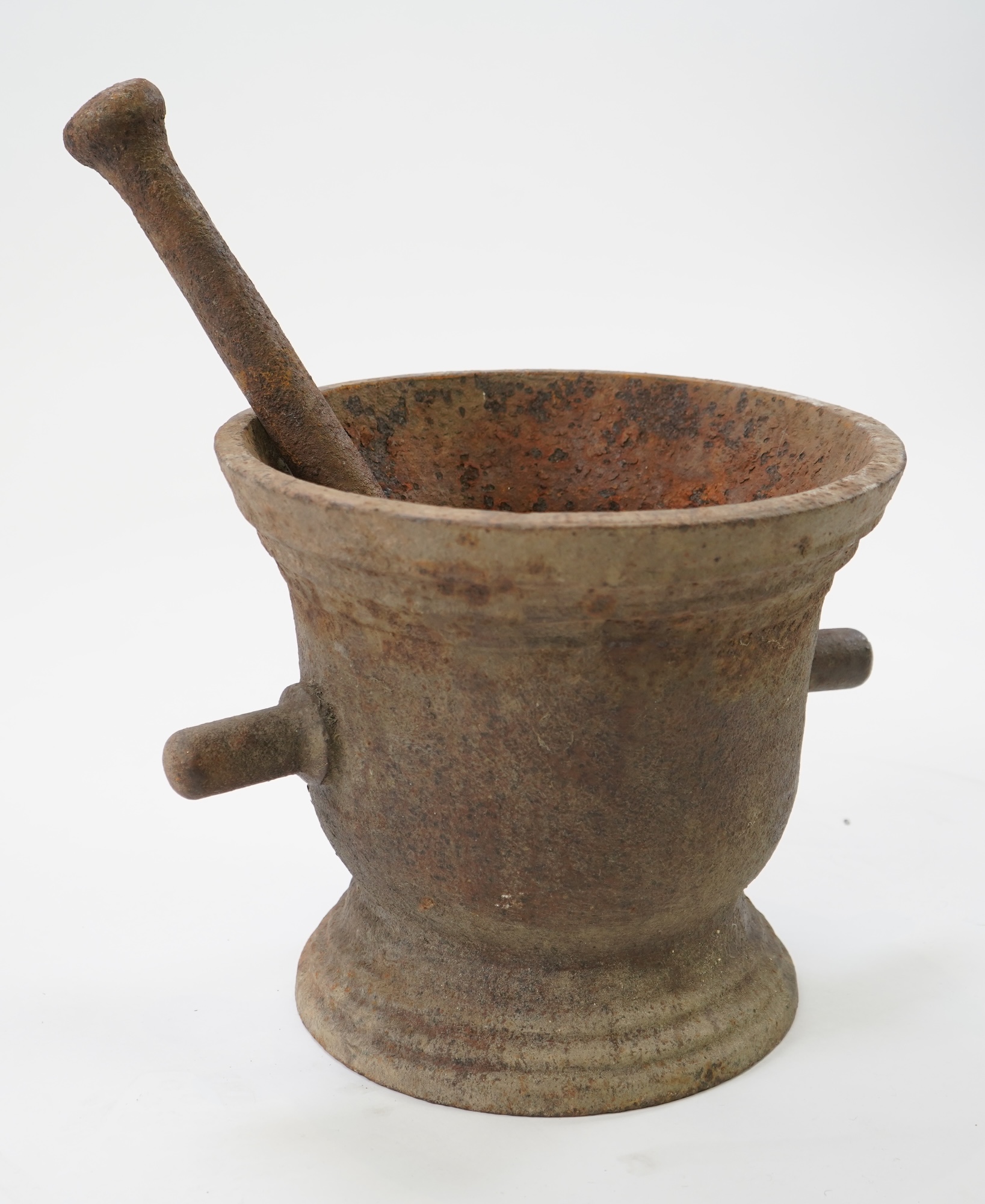 A large 18th/19thc cast iron mortar and pestle